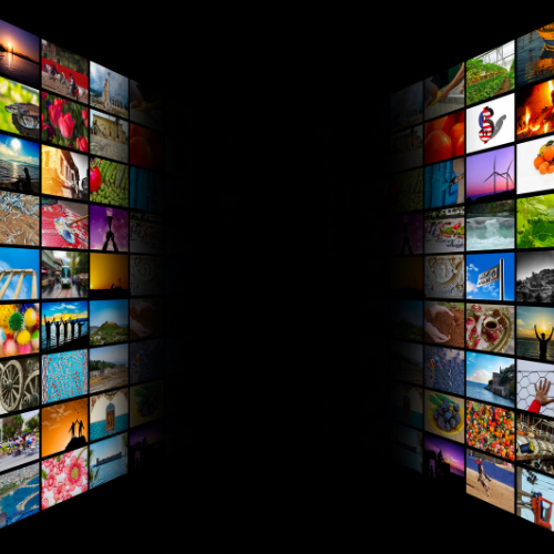 Wall of colorful video screens representing trailer and promotional music composition